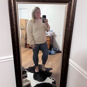 Cream Sweater with Blue Jeans